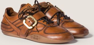 Miu Miu Leather sneakers with buckle