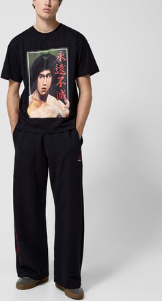 3.Paradis Mens Bruce Lee Chinese character wide-leg joggers