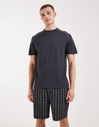 Lacoste Pantaloncini neri con stampa di monogramma e fascia in vita con logo-Nero