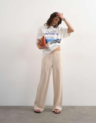 Topshop Pantaloni a fondo ampio allacciati in vita in raso &eacute;cru-Neutro