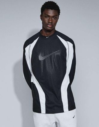 Nike Tech top a maniche lunghe con logo Swoosh centrale traforato in nero e bianco