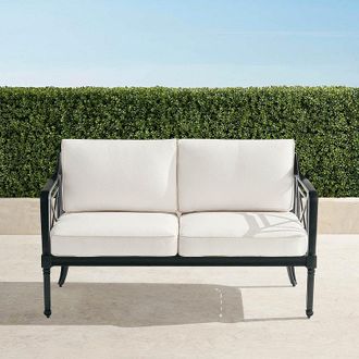 Frontgate Mercier Loveseat with Cushions in Onyx Aluminum - Standard, Boucle Snow with Logic Bone Piping - Frontgate