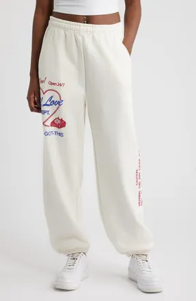 The Mayfair Group Self Love Club Oversize Fleece Graphic Sweatpants in Cream at Nordstrom, Size Xx-Large