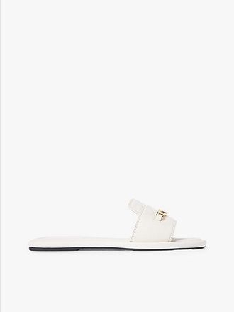 Tommy Hilfiger Mules planas de piel con monograma TH