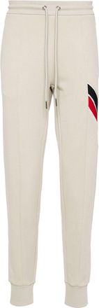 Moncler stripe-detail logo-appliqué track pants - men - Cotton/Polyamide - M - Neutrals