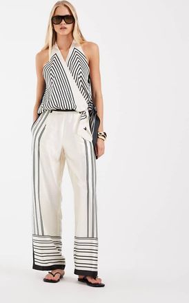 Vero Moda Pantaloni palazzo a fondo ampio color crema con stampa astratta in coordinato-Bianco
