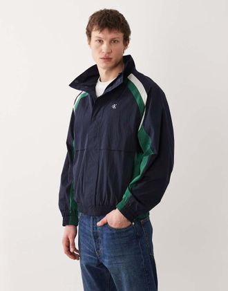 Calvin Klein Jeans Giacca a vento color block blu navy e verde