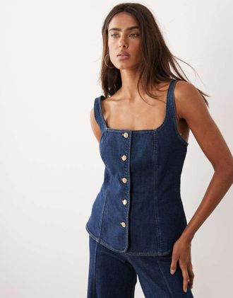 Good American Top in denim senza maniche lavaggio blu scuro con bottoni sul davanti in coordinato-Blu navy