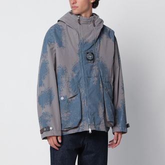 Stone Island Giacca in tessuto tecnico leggero motivo camouflage sfumato