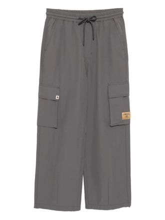 Fingercroxx logo-patch trousers - Grey
