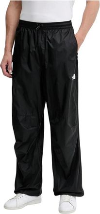 The North Face NSE Wind Track Pant - Heren - Trainingsbroeken - Zwart - XS - Nylon - Fitness