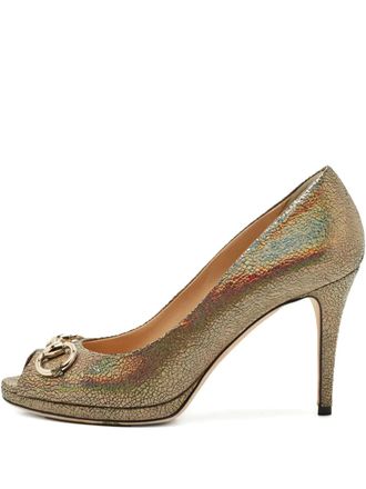 Gucci Iriserende pumps met open neus - Goud