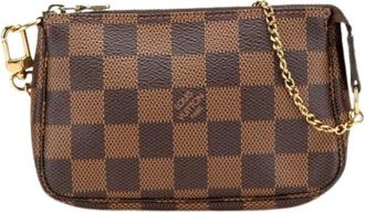 Louis Vuitton Pre-owned Clutches, female, Brown, Size: ONE SIZE Pre-owned Canvas Clutch