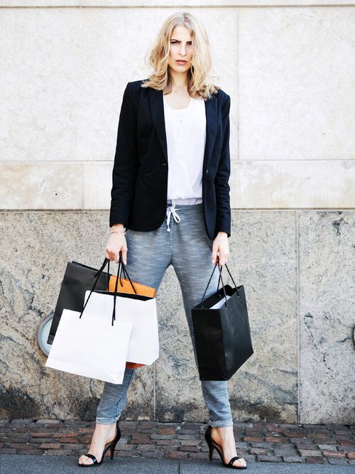 woman holding shopping bags