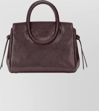 Staud mini crossbody bag featuring oval handles