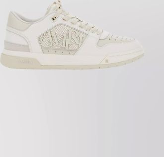 Amiri round toe low top sneakers with perforations