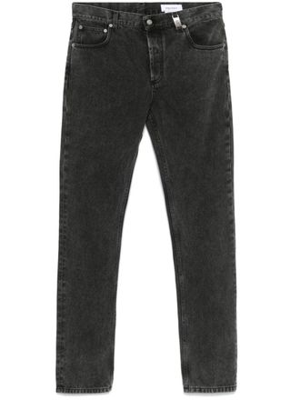 Alexander McQueen Jeans con placca logo - Grigio