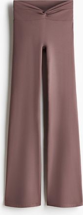 H&M Ausgestellte Yogaleggings mit SoftMove - Purple