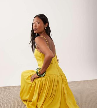 Asos Petite ASOS DESIGN Petite - Vestito midi svasato in raso giallo con fondo a palloncino e taglio sbieco