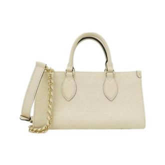 Louis Vuitton Pre-owned OnTheGo EW Monogram Empreinte Tas - Dames - Pre-owned - Beige - Maat: ONE Size Leer
