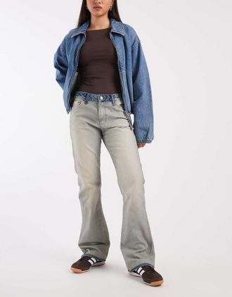 Calvin Klein Jeans Jeans bootcut in cotone lavaggio stone wash con fascia in vita a contrasto-Neutro