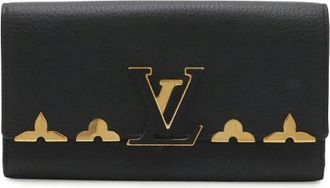 Louis Vuitton Pre-owned Portefeuille Capucines Taurillon Leather Long Bifold Wallet - Dames - Vintage Accessoires - Zwart - ONE Size - Leer - Vintage