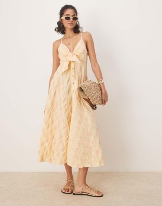 Free People Via - Vestito midi giallo a quadretti con spalline sottili