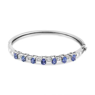House of Brilliance 14K White Gold 5 MM Oval Blue Tanzanite and 1/4 Cttw Diamond Bangle (H-I Color, VS2-SI1 Clarity) - 7 1/2 Inches