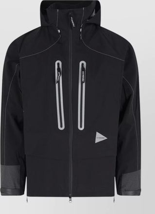 And Wander raincoat