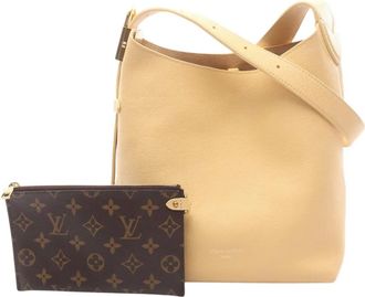 Louis Vuitton 2021-2025 Smooth Calfskin Low Key PM hobo bag - Brown