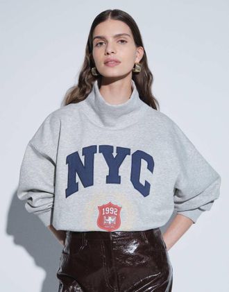 Asos felpa varsity oversize con collo a imbuto NYC in grigio m&eacute;lange