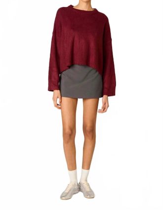 Nia Ariana Wide Ribbed Knit Sweater In Pinot