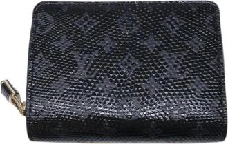 Louis Vuitton Pre-owned Wallets, female, Black, Size: ONE SIZE Pre-owned Portefeuille Round Zip Lizard Compact Wallet