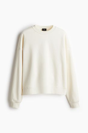 H&M Baumwollsweatshirt in Oversized Fit - Cremefarben