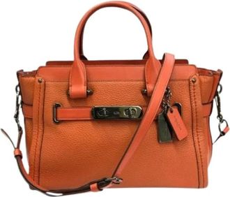 Coach Pre-owned Handbags, female, Orange, Size: ONE SIZE Pre-owned Leather shoulder-bags