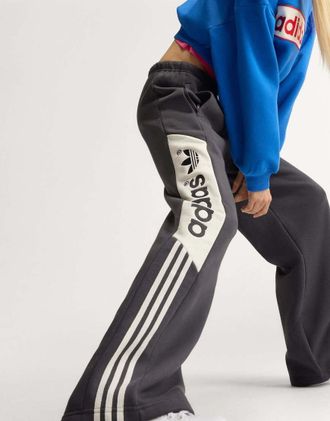 adidas Originals Adisignature ny pantaloni della tuta a gamba larga in nero utility