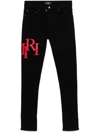 Amiri Staggered-logo-embroidered jeans - men - Elastomultiester/Cotton/Elastane/Sheepskin - 29 - Black