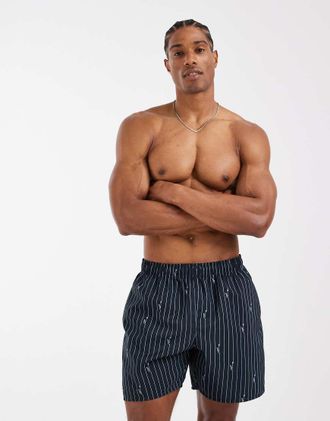 Lacoste Pantaloncini da bagno neri a righe effetto coccodrillo-Nero