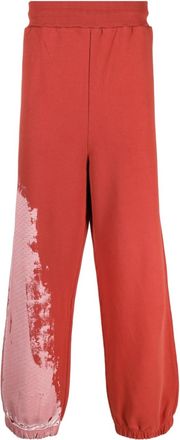 A-Cold-Wall* tie-dye pattern track pants - men - Cotton/Cotton - S - Red