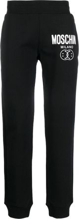 Moschino logo-print cotton track trousers - men - Organic Cotton - 50 - Black