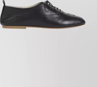 Celine triomphe leather loafers perforated detail