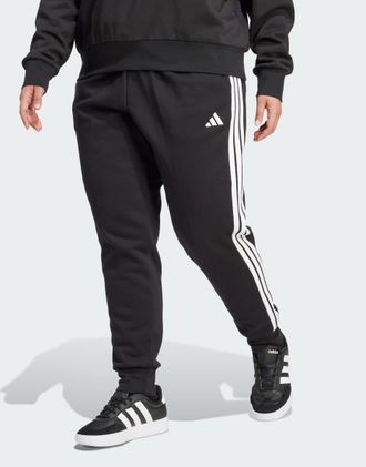 adidas adidas Performance Plus - Essentials - Pantaloni slim in pile neri con 3 strisce bianche-Nero