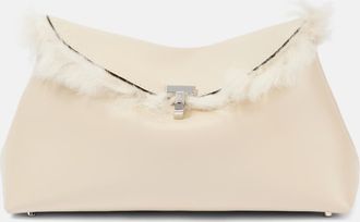 Toteme T-Lock shearling-lined leather clutch