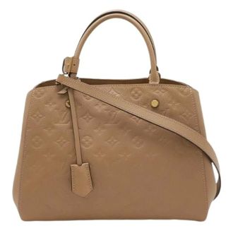 Louis Vuitton Pre-owned Montaigne Monogram Empreinte Handtas - Dames - Pre-owned - Bruin - Maat: ONE Size Leer