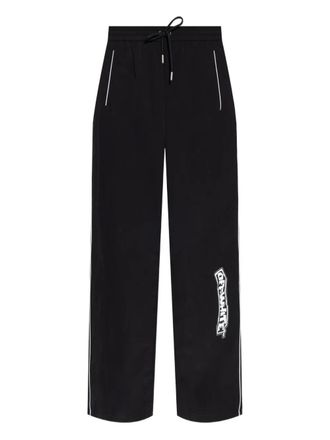 Off-white logo-detail side-stripe trousers - men - Polyamide - L - Black