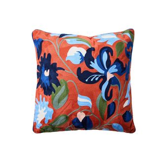 Novit&agrave; Home Bordado - coj&iacute;n con flores azules sobre fondo naranja