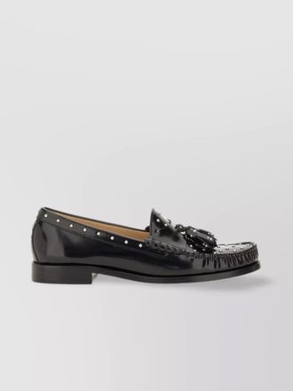 Stuart Weitzman loafers with studded detailing and tassel embellishment