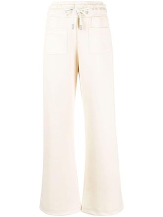 Off-white Pantaloni sportivi svasati con ricamo - Giallo