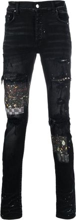 Amiri paint-splatter patched jeans - men - Cotton/Polyester/Spandex/Elastane - 38 - Black