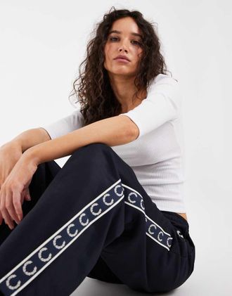 Fred Perry pantaloni da tuta con bande laterali navy-blu navy